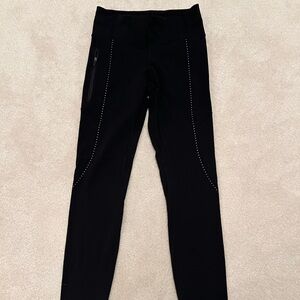 Lululemon Black Leggings with Zippers and White Dotted Accents